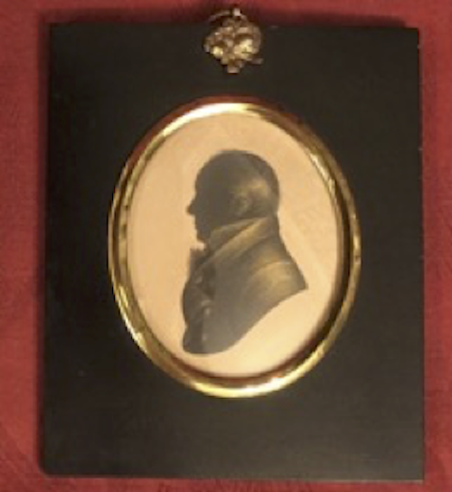 Bust length silhouette portrait of man looking left by Jeffreson.  Private Collection