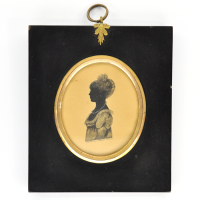 Front of Silhouette, in frame, with woman looking left