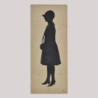 Silhouette of a woman looking left