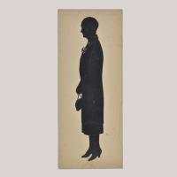 Silhouette of a woman looking left