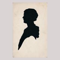 Front of silhouette, with woman looking left.