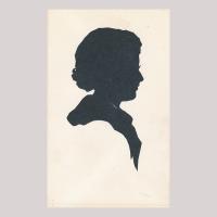 Front of silhouette, with woman looking right.