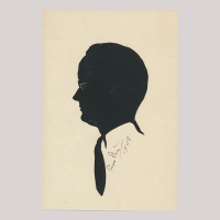Front of silhouette, Man wearing glasses and looking to the left
