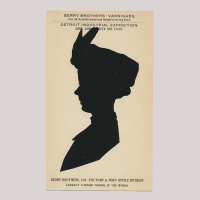 Front of silhouette, with woman looking left, wearing a hat. With inscription.
