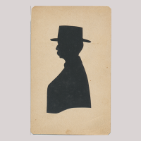 Front of silhouette, with man looking left, in suit weraing a hat.