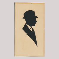 Front of silhouette, with man looking right, in suit and wearing a hat.