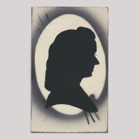 Front of silhouette, with woman looking right in oval frame.