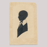 Front of silhouette, with boy looking left.