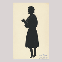 Front of silhouette, with woman looking left, wearing a skirt, signed by the artist in the right-hand corner.