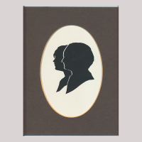 Front of silhouette, with man and woman looking left. Close-up the man; in the background the woman.