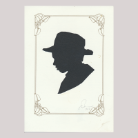 Front of silhouette, with boy in frame looking left, wearing a hat.