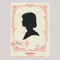 Front of silhouette, with girl in frame looking left.