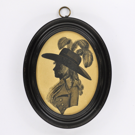 
        Front of Silhouette, in frame, with woman looking left wearing a hat decorate with  plumesd