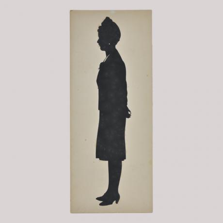
        Silhouette of a woman looking left