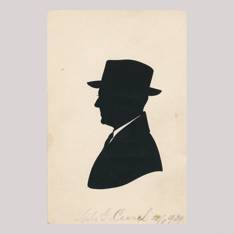 
        Front of silhouette, with man looking left, wearing a suit and a hat.