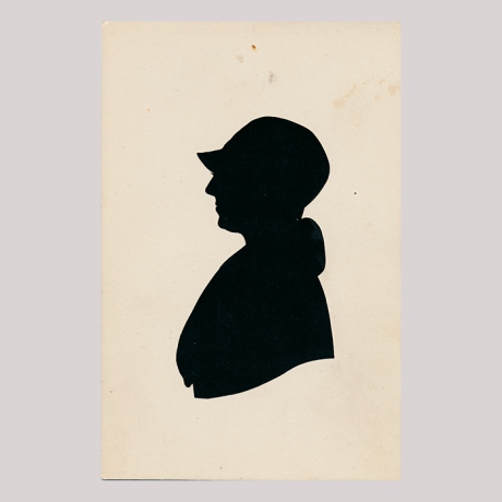 
        Front of silhouette, with a woman looking left, wearing a hat and a fur collar.