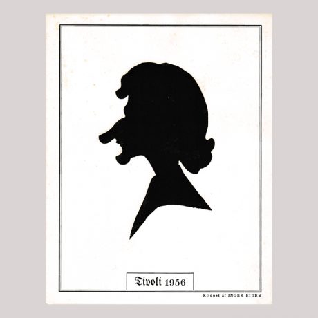 
        Front of silhouette, with a caricature of a human being, in a painted square frame.