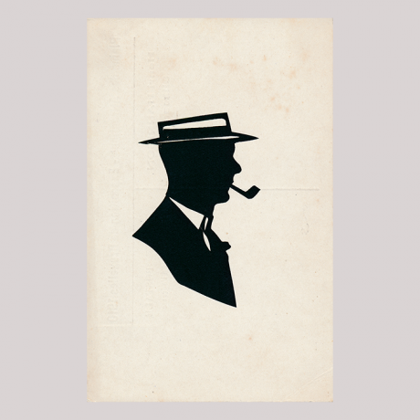 
        Front of silhouette, Man with a white collar looking to the right