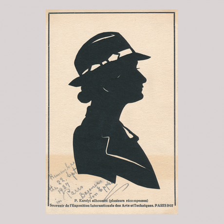 
        Front of silhouette, with woman looking right, wearing a hat.