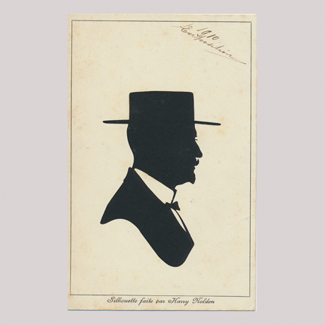 
        Front of silhouette, Man wearing a hat and looking to the right
