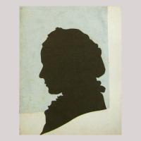 Life size silhouette of a woman facing left