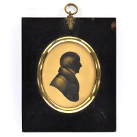 Front of Silhouette, in frame, with man looking right