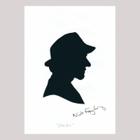 Front of silhouette, with man looking right, wearing a hat.