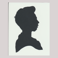 Silhouette with man looking right.