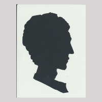 Silhouette with man looking right.
