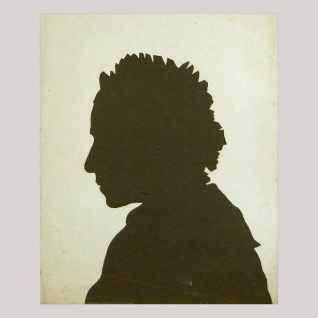 
        Life size silhouette of a woman facing left