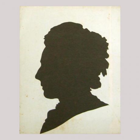 
        Life size silhouette of a woman facing left