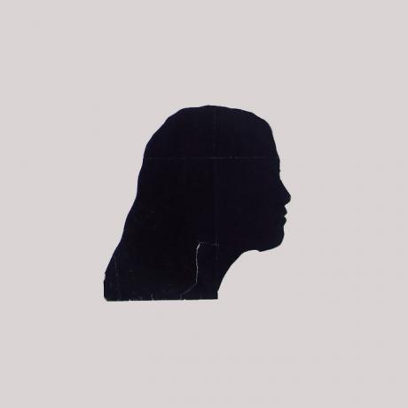 
        Life size silhouette of a young woman facing right