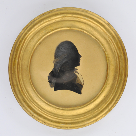 
        Front of silhouette, in frame, with man looking right.