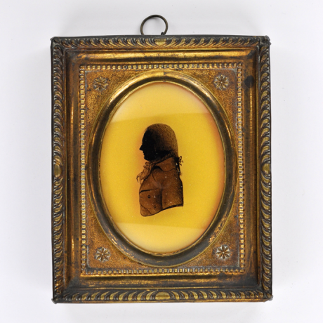 
        Front of Silhouette, in frame, with man looking left