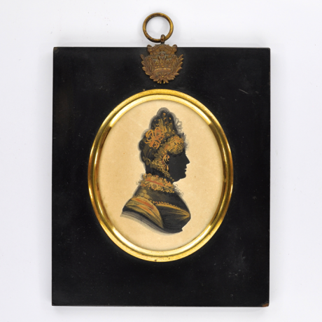 
        Front of Silhouette, in frame, with woman looking right and wearing a hat