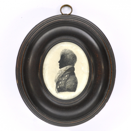 
        Front of silhouette, in frame, with man looking left, wearing a stock.