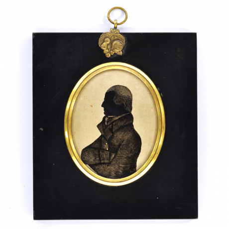 
        Front of Silhouette, in frame, with man looking left