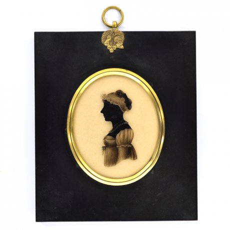 
        Front of Silhouette, in frame, with woman looking left and wearing a bonnet