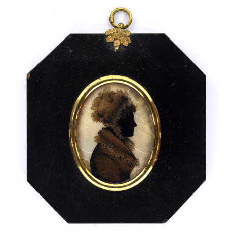 Front of Silhouette, in frame, with woman looking right