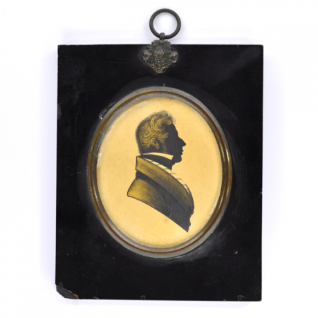 Front of silhouette, in frame, with man looking right, weraing a stock.