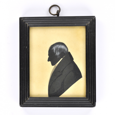 
        Front of silhouette, in frame, with man looking left.