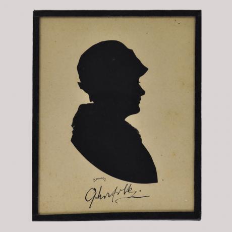 
        Silhouette of a woman looking right