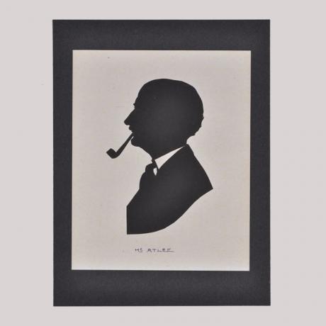 
        Silhouette of a man with pipe looking left