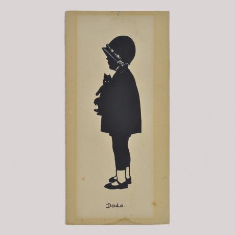 
        Silhouette of a girl with puppet looking left