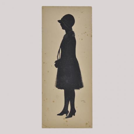 
        Silhouette of a woman looking left