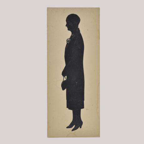 
        Silhouette of a woman looking left