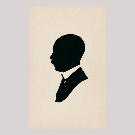 
        Front of silhouette, Man with a white collar looking to the left
