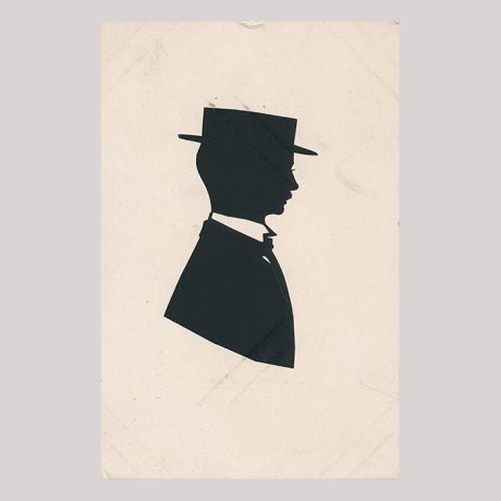 
        Front of silhouette, Man with a white collar looking to the right