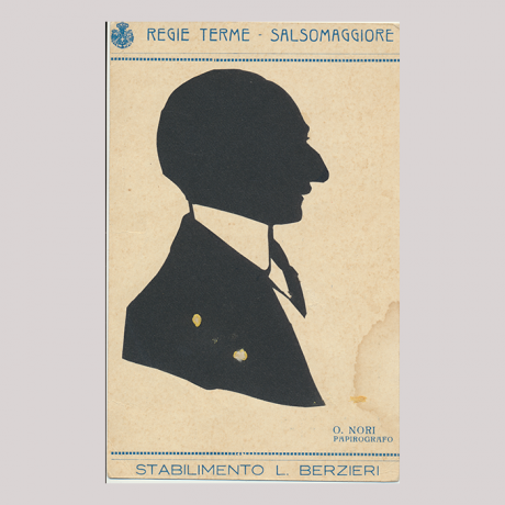 
        Front of silhouette, Man with a white collar looking to the right