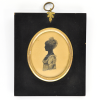 Front of Silhouette, in frame, with woman looking left